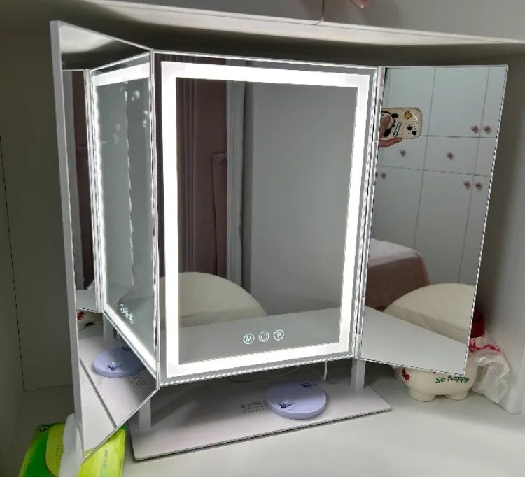 Vikbar sminkspegel med LED-belysning